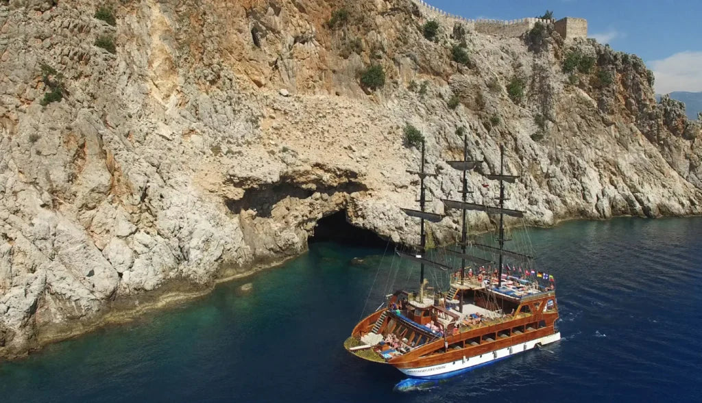 Alanya Catamaran Boat Tour with swimming breaks, music, sea views and Mediterranean coastline