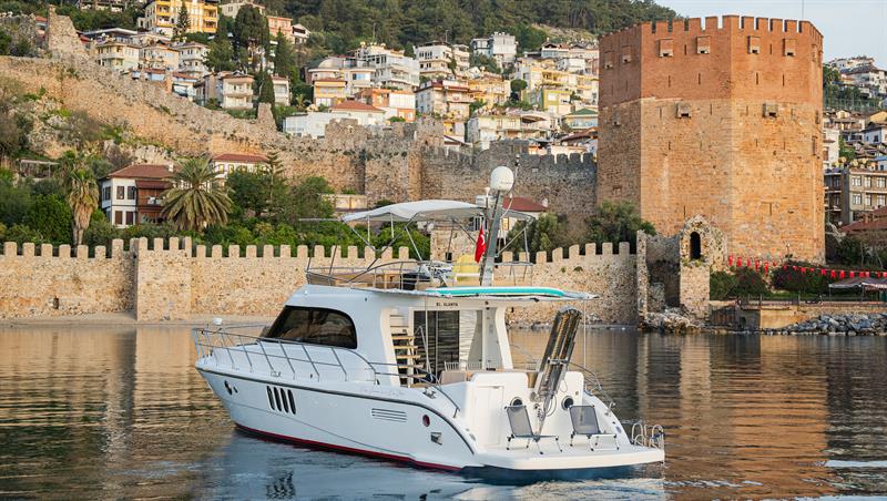 Alanya Private Boat Tour with exclusive yacht experience, swimming breaks and scenic Mediterranean views