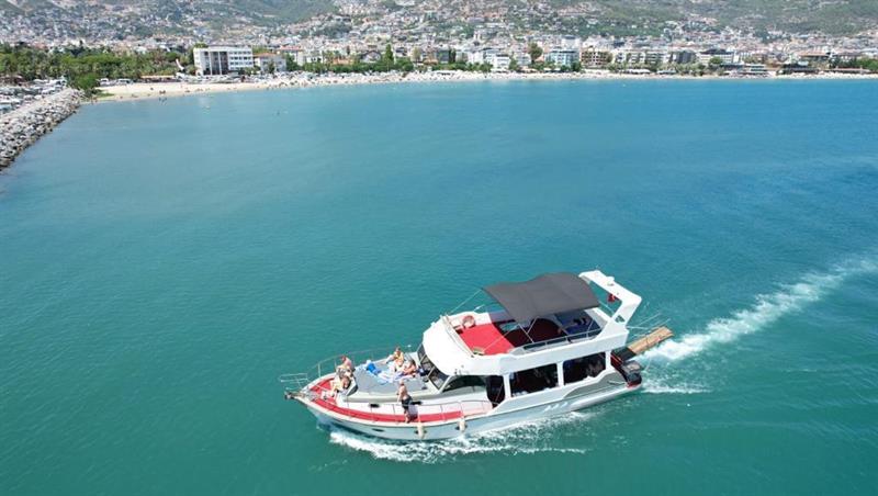 Alanya Private Boat Tour with exclusive yacht experience, swimming breaks and scenic Mediterranean views